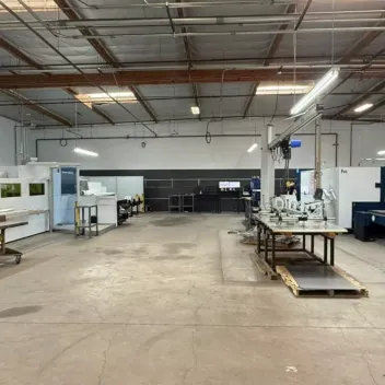 Interior of the Fabworks shop floor with laser cutting and tube laser machines